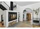 Living room fireplace and modern staircase at 6795 E Arizona Ave # B, Denver, CO 80224