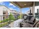 Inviting balcony with plenty of seating and beautiful outdoor views at 8883 Ramblestone St, Highlands Ranch, CO 80129