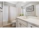 Bathroom with shower and bath combination, single vanity, and neutral walls and floor at 8883 Ramblestone St, Highlands Ranch, CO 80129