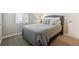 Calm bedroom featuring soft carpet, neutral walls and a comfortable bed with stylish pillows at 8883 Ramblestone St, Highlands Ranch, CO 80129