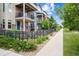 Charming townhomes with private balconies, landscaped yards, and inviting curb appeal at 8883 Ramblestone St, Highlands Ranch, CO 80129