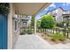 Private patio with covered space and garden views at 8883 Ramblestone St, Highlands Ranch, CO 80129
