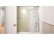 Bathroom with shower featuring glass sliding doors at 3054 S Raleigh St, Denver, CO 80236