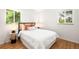 Inviting bedroom with a comfortable bed, soft textures, and natural light at 3054 S Raleigh St, Denver, CO 80236