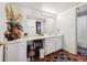 Bathroom offers a large vanity with a well-lit mirror at 9995 E Harvard Ave # 221, Denver, CO 80231