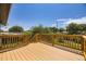 Spacious wood deck, perfect for entertaining or relaxing with a view of the backyard at 11462 W Tennessee Pl, Lakewood, CO 80226