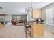 Open concept bar area that features pendant lighting and seating at 11465 W Atlantic Ave, Lakewood, CO 80227
