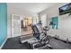 Well equipped exercise room with machines and natural light at 11465 W Atlantic Ave, Lakewood, CO 80227