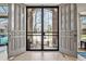 Elegant foyer with decorative glass doors and an inviting view to the outside at 11465 W Atlantic Ave, Lakewood, CO 80227