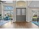 Grand foyer featuring high ceilings, decorative front doors, and views to a lovely sitting room at 11465 W Atlantic Ave, Lakewood, CO 80227