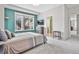 Cozy main bedroom featuring a large window and serene ambiance at 11465 W Atlantic Ave, Lakewood, CO 80227