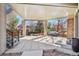 Inviting covered patio with plenty of space for entertaining and relaxing in the backyard at 11465 W Atlantic Ave, Lakewood, CO 80227