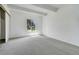 Bright bedroom featuring a large window and neutral carpeting and paint at 2525 S Dayton Way # 1510, Denver, CO 80231