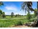 Scenic view of the lush green golf course from the property at 2525 S Dayton Way # 1510, Denver, CO 80231