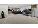 Finished basement space, ideal for a media room or recreation area at 5845 W Portland Dr, Littleton, CO 80128