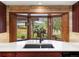 Kitchen sink with backyard view at 5845 W Portland Dr, Littleton, CO 80128