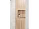 Close-up showcasing the stylish shelving in the bathroom, with modern accents at 4395 Newland St, Wheat Ridge, CO 80033