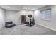 Finished basement featuring neutral colors, carpeted floor, recessed lighting, and space for fitness at 12430 S Downy Creek Ct, Parker, CO 80134