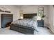 Relaxing main bedroom with a king-size bed, matching nightstands, dresser, and artwork for a cozy and stylish retreat at 12430 S Downy Creek Ct, Parker, CO 80134
