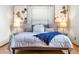 Bright bedroom featuring stylish decor, soothing color palette, and plush bedding for a relaxing ambiance at 942 S Walden St # 204, Aurora, CO 80017