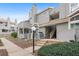 Charming condo featuring a private porch, complemented by well-maintained landscaping and convenient stairway access at 942 S Walden St # 204, Aurora, CO 80017