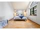 Serene main bedroom featuring a vaulted ceiling and ample natural light at 942 S Walden St # 204, Aurora, CO 80017