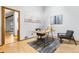 Functional home office with a modern desk, comfortable seating, and serene decor, ideal for productivity at 942 S Walden St # 204, Aurora, CO 80017