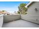 Outdoor patio with neutral siding providing a private area for relaxation or entertainment at 942 S Walden St # 204, Aurora, CO 80017