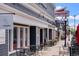 Picturesque street view of local businesses with outdoor seating and awnings at 2017 N Fork Dr, Lafayette, CO 80026