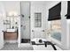 Modern bathroom featuring a soaking tub, tiled shower, and sleek wooden vanity at 2515 Zenobia St, Denver, CO 80212