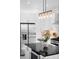 Bright kitchen featuring white cabinetry, stainless steel appliances, and a stylish island at 2515 Zenobia St, Denver, CO 80212