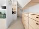 Spacious walk-in closet with ample storage, shelving, and unique decor pieces at 2515 Zenobia St, Denver, CO 80212