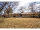 Large grassy backyard with patio at 430 Long View Ct, Longmont, CO 80501