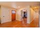 Inviting foyer with hardwood floors, offering a view into the home's interior at 430 Long View Ct, Longmont, CO 80501