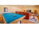 Game room featuring a pool table, comfortable seating, and an entertainment setup at 430 Long View Ct, Longmont, CO 80501