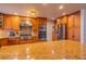 Well-equipped kitchen with stainless steel appliances, and granite countertops at 430 Long View Ct, Longmont, CO 80501