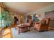 Spacious living room showcasing hardwood floors, comfortable seating, and an inviting atmosphere at 430 Long View Ct, Longmont, CO 80501