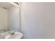 Bathroom with a mirror and sink at 17962 E 103Rd Ave, Commerce City, CO 80022
