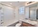 Bathroom with a mirror and sink at 17962 E 103Rd Ave, Commerce City, CO 80022