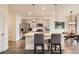 Spacious kitchen with white countertops, stainless steel appliances, and a breakfast bar at 16135 Mountain Flax Dr, Monument, CO 80132