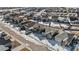 An aerial view of a well-planned neighborhood, featuring neatly arranged homes and streets at 27882 E 9Th Dr, Aurora, CO 80018