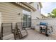 Outdoor deck with seating, grill, privacy fence and awning at 13545 W 62Nd Ln, Arvada, CO 80004