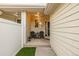 Cozy front porch with seating, offering a welcoming entrance to the home at 13545 W 62Nd Ln, Arvada, CO 80004