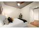 Comfortable bedroom with a ceiling fan, neutral walls, and a well-made bed with decorative pillows at 1700 Bassett St # 609, Denver, CO 80202