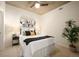 Cozy bedroom featuring neutral colors, artwork and natural light at 1700 Bassett St # 609, Denver, CO 80202