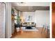 Bright and stylish living room featuring hardwood floors and outdoor balcony access at 1700 Bassett St # 609, Denver, CO 80202
