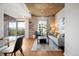 Bright living room features hardwood floors, modern furniture, and outdoor balcony access at 1700 Bassett St # 609, Denver, CO 80202