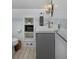 Stylish bathroom with a tiled shower and decorative lighting above the sink and vanity at 482 S Logan St, Denver, CO 80209