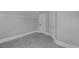 Bright bedroom featuring plush gray carpet, white trim, and well-lit with ample natural light at 482 S Logan St, Denver, CO 80209