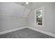 Cozy bedroom with gray walls, carpet, recessed lighting and a bright window enhancing the natural light at 482 S Logan St, Denver, CO 80209
